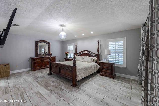 806 Falkirk Ct, Orange Park, FL 32073 - bedroom with baseboards, a textured ceiling, and recessed lighting