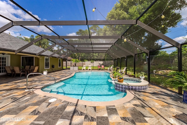 806 Falkirk Ct, Orange Park, FL 32073 - view of pool featuring a patio area, a pool with connected hot tub, fence, and a lanai