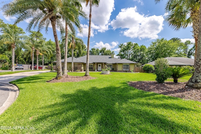 806 Falkirk Ct, Orange Park, FL 32073 - view of front of property featuring a chimney, a front yard, and driveway