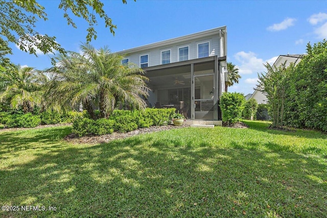 433 Marsh Cove Dr, Ponte Vedra Beach, FL 32082 - back of house featuring a sunroom, a ceiling fan, and a yard