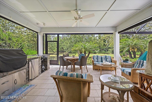 433 Marsh Cove Dr, Ponte Vedra Beach, FL 32082 - sunroom / solarium featuring a ceiling fan, an outdoor kitchen, outdoor lounge area, and healthy amount of natural light