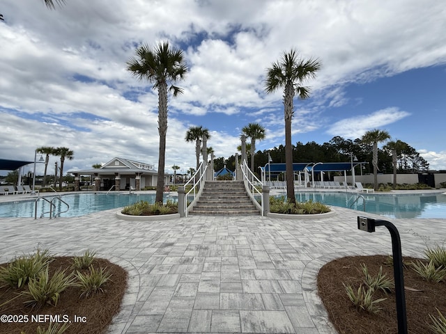 community pool featuring a patio