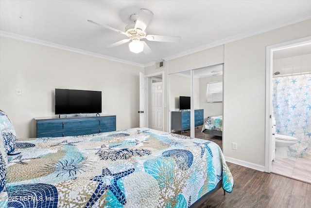 bedroom featuring wood finished floors, a closet, crown molding, ceiling fan, and ensuite bathroom