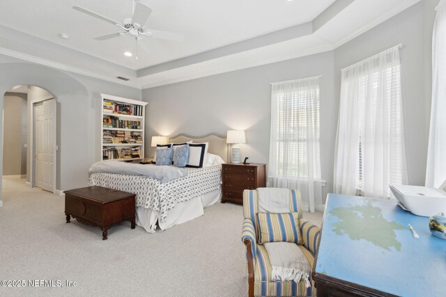 724 Piney Pl, Saint Johns, FL 32259 - bedroom with carpet floors, arched walkways, a tray ceiling, ceiling fan, and recessed lighting