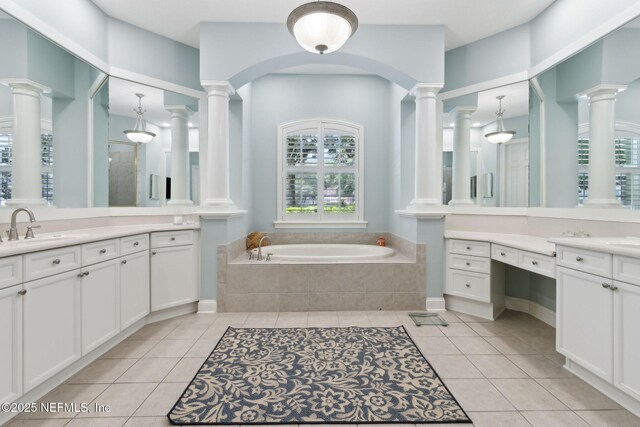 724 Piney Pl, Saint Johns, FL 32259 - bathroom featuring tile patterned floors, decorative columns, and a bath