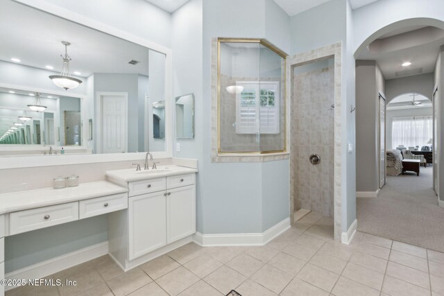 724 Piney Pl, Saint Johns, FL 32259 - ensuite bathroom with walk in shower, baseboards, tile patterned floors, and vanity