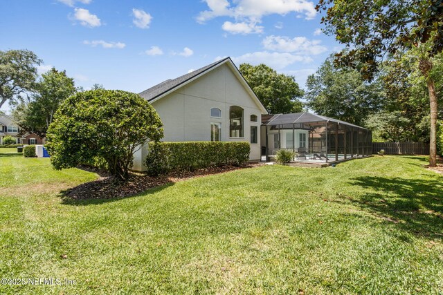 724 Piney Pl, Saint Johns, FL 32259 - rear view of house featuring glass enclosure and a swimming pool