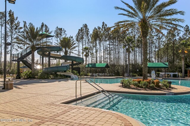 724 Piney Pl, Saint Johns, FL 32259 - community pool featuring a water slide and a patio