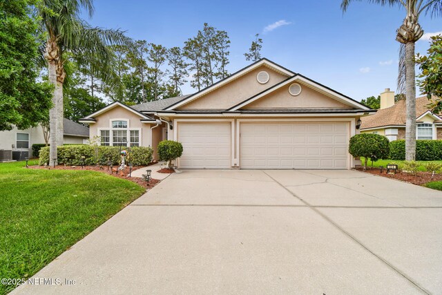 324 Hammock Grove Ct, Saint Johns, FL 32259 - view of front of house featuring stucco siding, concrete driveway, an attached garage, and a front yard