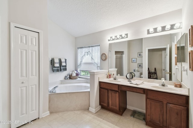 324 Hammock Grove Ct, Saint Johns, FL 32259 - full bathroom featuring a bath, double vanity, a closet, a textured ceiling, and a shower stall