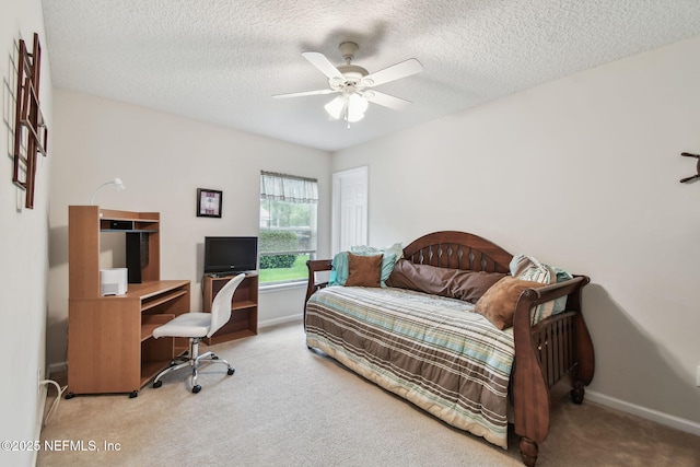 324 Hammock Grove Ct, Saint Johns, FL 32259 - carpeted bedroom featuring baseboards, an office area, a textured ceiling, and ceiling fan