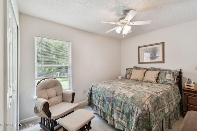 324 Hammock Grove Ct, Saint Johns, FL 32259 - bedroom featuring baseboards, carpet flooring, a textured ceiling, and ceiling fan