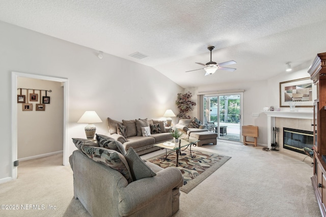 324 Hammock Grove Ct, Saint Johns, FL 32259 - living room with light carpet, a ceiling fan, a fireplace, lofted ceiling, and baseboards