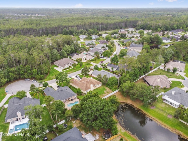 324 Hammock Grove Ct, Saint Johns, FL 32259 - aerial view of property's location with a heavily wooded area, nearby suburban area, and a nearby body of water