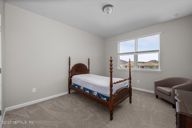 698 Cherry Elm Dr, Saint Augustine, FL 32092 - bedroom featuring baseboards and light carpet