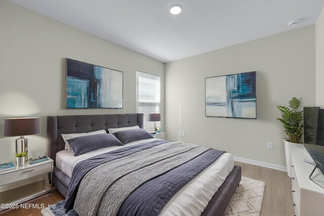 5420 Arlington Rd, Jacksonville, FL 32211 - bedroom featuring wood finished floors and baseboards