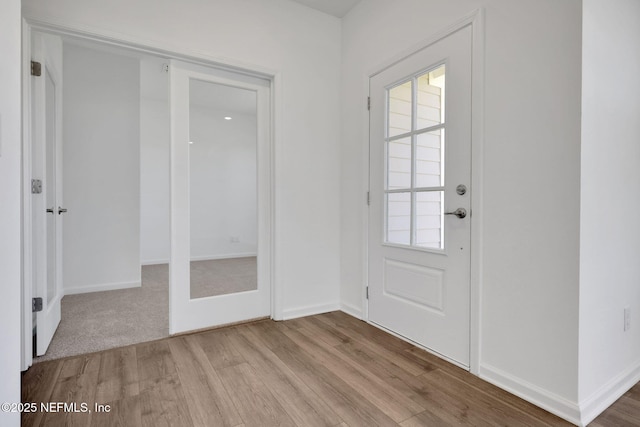 478 Cherry Elm Dr, Saint Augustine, FL 32092 - entryway with wood finished floors and baseboards