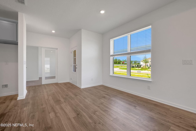 478 Cherry Elm Dr, Saint Augustine, FL 32092 - unfurnished room with wood finished floors, baseboards, and recessed lighting
