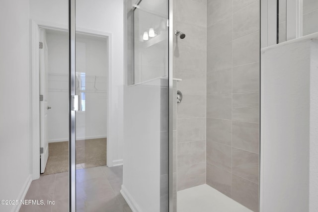 478 Cherry Elm Dr, Saint Augustine, FL 32092 - full bath with a shower stall, tile patterned floors, and baseboards