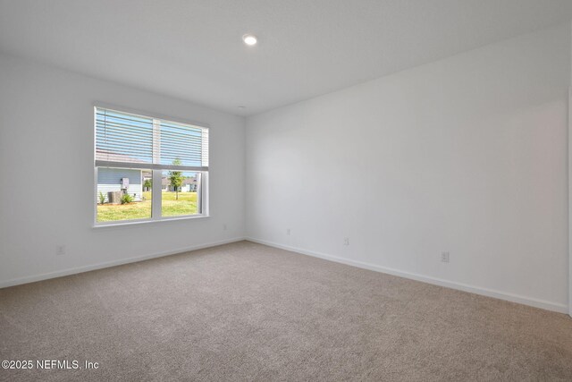 478 Cherry Elm Dr, Saint Augustine, FL 32092 - empty room with light colored carpet, baseboards, and recessed lighting