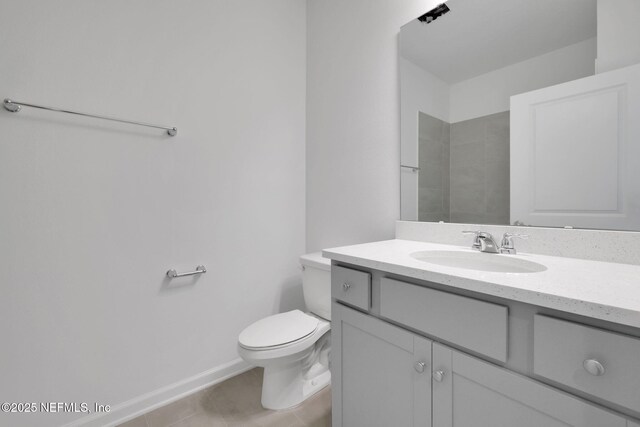 478 Cherry Elm Dr, Saint Augustine, FL 32092 - full bathroom featuring toilet, tile patterned flooring, vanity, and baseboards