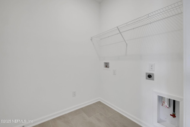 478 Cherry Elm Dr, Saint Augustine, FL 32092 - clothes washing area with electric dryer hookup, hookup for a washing machine, and baseboards