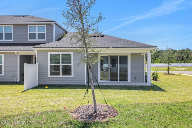 478 Cherry Elm Dr, Saint Augustine, FL 32092 - rear view of property with a yard and a shingled roof