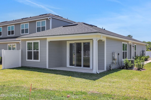 478 Cherry Elm Dr, Saint Augustine, FL 32092 - rear view of house featuring a yard, a patio area, and a shingled roof