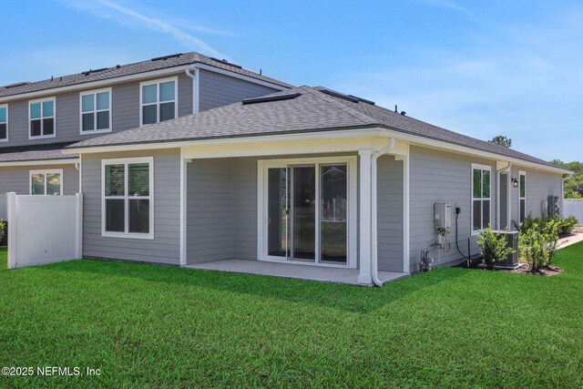 478 Cherry Elm Dr, Saint Augustine, FL 32092 - back of house with a lawn, a patio area, and a shingled roof