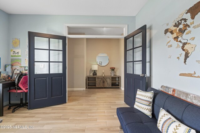 383 Saint Vincent Dr, Saint Augustine, FL 32092 - entryway with light wood finished floors and baseboards