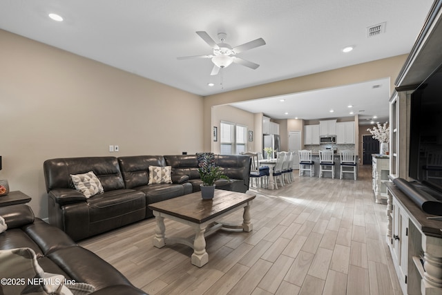 383 Saint Vincent Dr, Saint Augustine, FL 32092 - living area featuring a ceiling fan, light wood finished floors, and recessed lighting