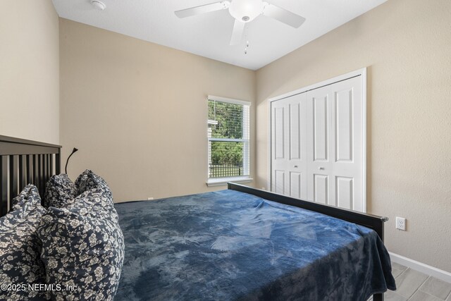 383 Saint Vincent Dr, Saint Augustine, FL 32092 - bedroom featuring baseboards, a ceiling fan, and a closet