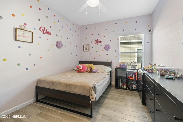 383 Saint Vincent Dr, Saint Augustine, FL 32092 - bedroom featuring light wood-style floors, baseboards, and a ceiling fan