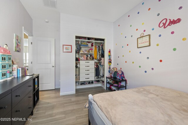 383 Saint Vincent Dr, Saint Augustine, FL 32092 - bedroom with light wood-type flooring and a closet