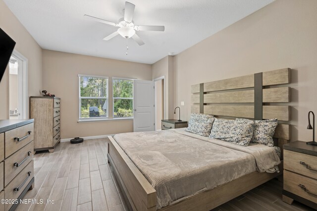 383 Saint Vincent Dr, Saint Augustine, FL 32092 - bedroom with wood finished floors, ceiling fan, and baseboards