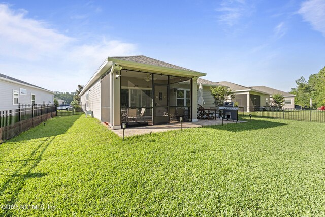383 Saint Vincent Dr, Saint Augustine, FL 32092 - back of house with a sunroom, a patio area, and a ceiling fan