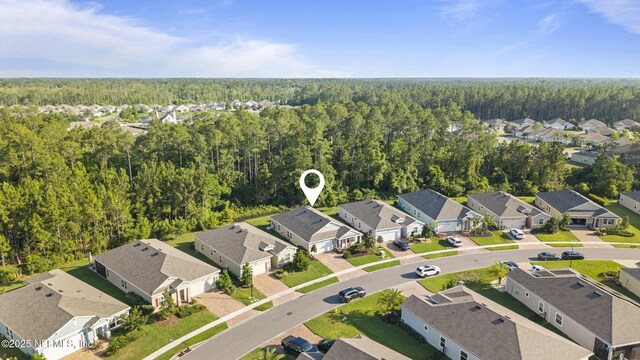 383 Saint Vincent Dr, Saint Augustine, FL 32092 - aerial view of residential area with a heavily wooded area