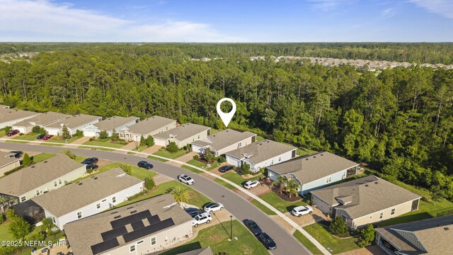 383 Saint Vincent Dr, Saint Augustine, FL 32092 - aerial perspective of suburban area featuring a heavily wooded area
