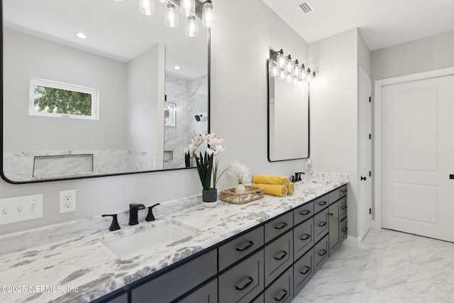 97002 Jose Gaspar Way, Yulee, FL 32097 - full bath featuring marble look tiles, a stall shower, and double vanity