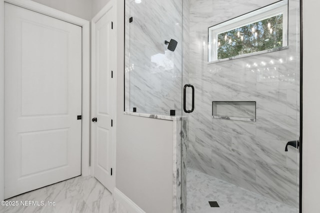 97002 Jose Gaspar Way, Yulee, FL 32097 - full bath featuring a marble finish shower, marble finish flooring, and baseboards