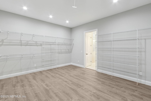 97002 Jose Gaspar Way, Yulee, FL 32097 - walk in closet with wood finished floors