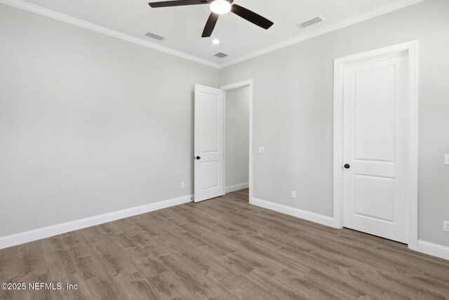 97002 Jose Gaspar Way, Yulee, FL 32097 - unfurnished bedroom featuring wood finished floors, baseboards, crown molding, recessed lighting, and ceiling fan