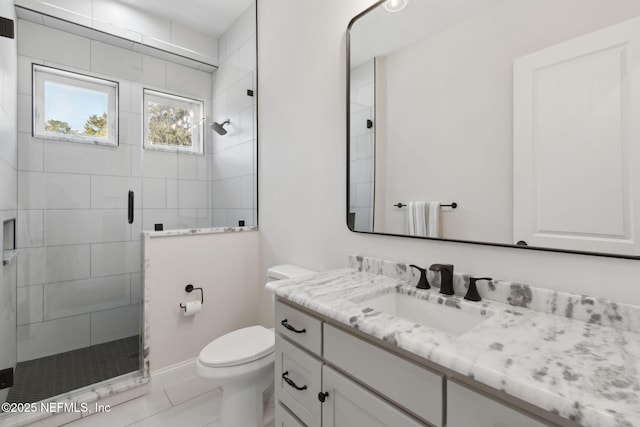 97002 Jose Gaspar Way, Yulee, FL 32097 - bathroom with toilet, a shower stall, vanity, and tile patterned floors