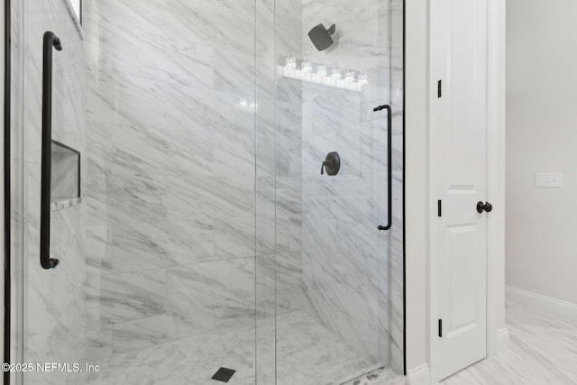 97002 Jose Gaspar Way, Yulee, FL 32097 - bathroom featuring a marble finish shower and baseboards