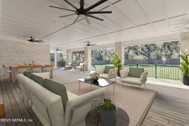 97002 Jose Gaspar Way, Yulee, FL 32097 - deck featuring an outdoor hangout area, a ceiling fan, a fenced backyard, and outdoor dining area