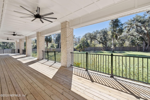 97002 Jose Gaspar Way, Yulee, FL 32097 - wooden terrace with a ceiling fan