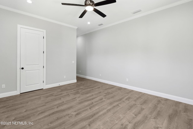 97002 Jose Gaspar Way, Yulee, FL 32097 - spare room with ceiling fan, recessed lighting, baseboards, wood finished floors, and crown molding