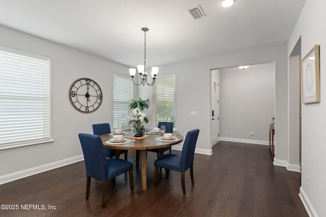 275 Kellet Way, Saint Johns, FL 32259 - dining area with a chandelier, dark wood-style flooring, and baseboards