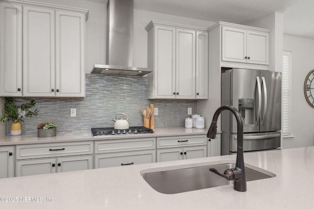 275 Kellet Way, Saint Johns, FL 32259 - kitchen featuring wall chimney range hood, appliances with stainless steel finishes, a sink, and light countertops