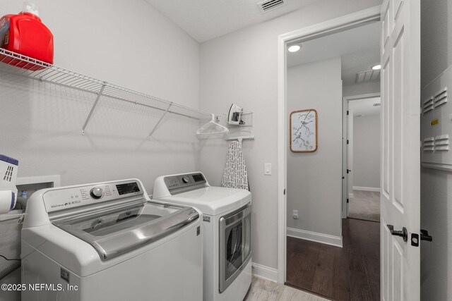 275 Kellet Way, Saint Johns, FL 32259 - laundry area with washing machine and dryer, light wood-style flooring, baseboards, and recessed lighting